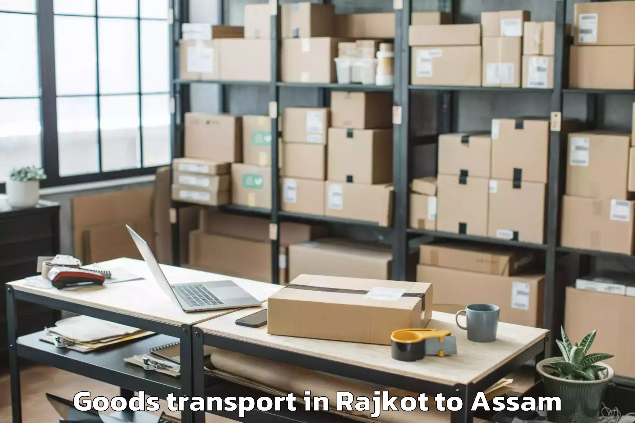 Hassle-Free Rajkot to Kharupetia Goods Transport